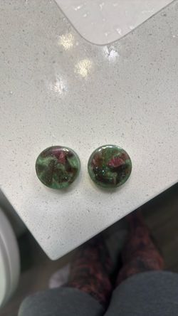 Resin handmade plugs available in various sizes.