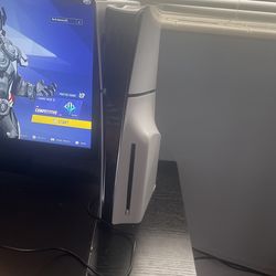 Ps5 slim with small samsung moniter , light blue new controller with 2 years warranty and hyper X headset