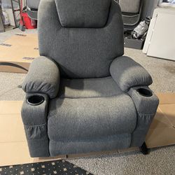 Reclining chair w/ charging station, heater, & massager
