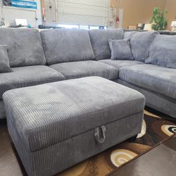 Gray Corduroy Sectional with storage ottoman