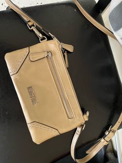 Kenneth Cole gold pocket book