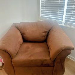 BROWN OVAL SECTIONAL AND COUCH