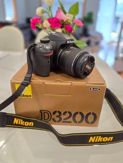 Nikon D3200 DSLR Camera with Lens and Strap