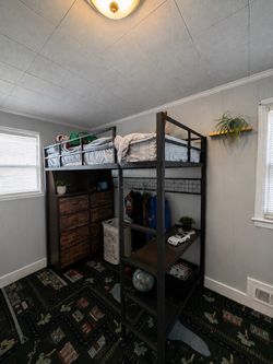 Black Twin Metal Loft Bed with Shelving and Desk
