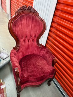 2 red velvet chairs