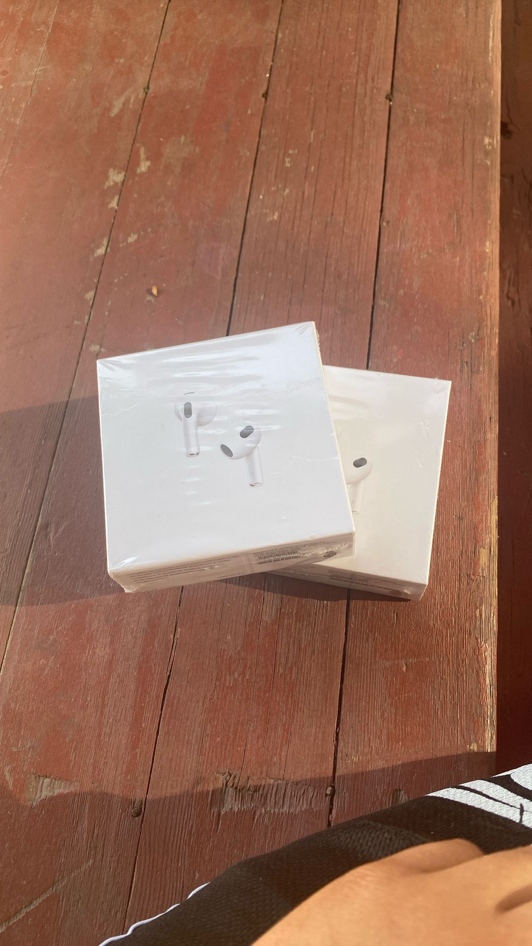 Apple AirPods 3rd generation with a MagSafe Charging Case
