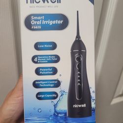 NEW DENTAL IRRIGATOR