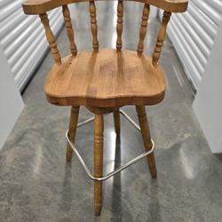 Pair of 360° Swiveling Wooden Stools - $70