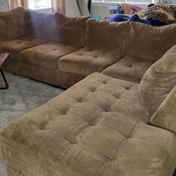 Brown Sectional And Ottoman 
