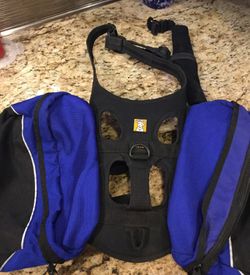 RUFFWEAR dog backpack. Size small I excellent condition. This fit my standard schnauzer. RUFFWEAR makes a quality product- $75x00 new.