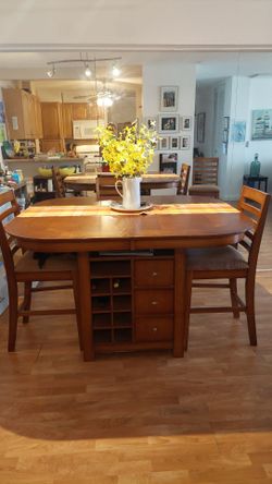 Round wood table with 6 chairs