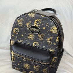 * 87th Ave & Olive* *NWT* Harry Potter Celestial Magical Creatures Mini Backpack Gold/Black. Harry Potter wand zipper charm. Black interior fabric. 