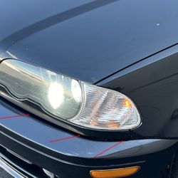 BMW M3 330ci 328ci 325ci DRIVER LOWER HEADLIGHT COVER