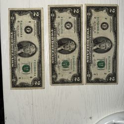 three two-dollar bills