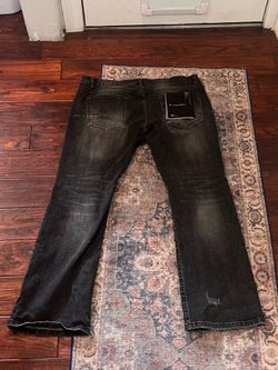 Purples jeans, black, ripped, size 38.