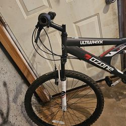 Bicyclr Ozone 500 Boys' Shock Force 24 in 21-Speed Full Suspension Mountain Bike
(Like New)