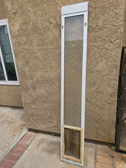Dog door for slider