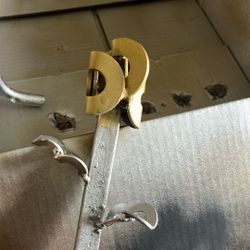 Welded flower, gold, and silver