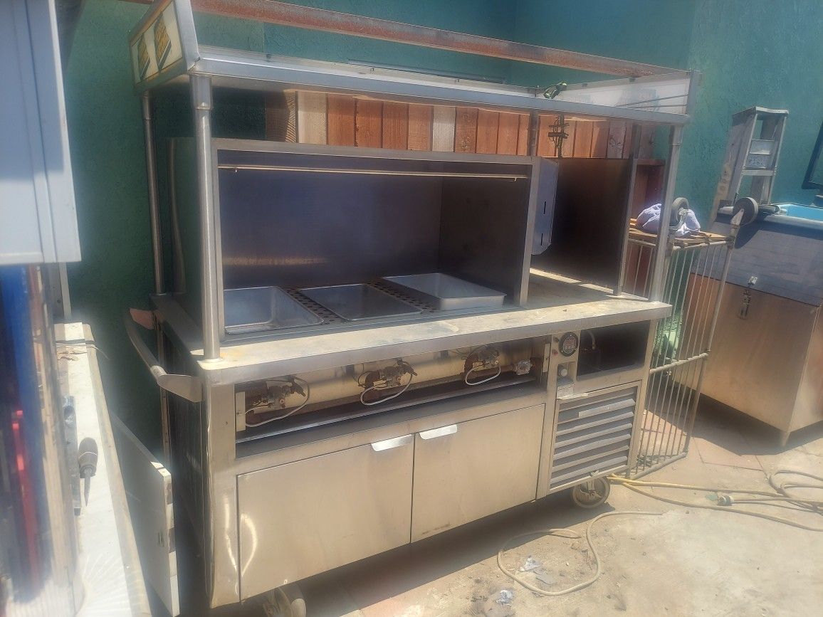 Hot dog cart with built-in fridge