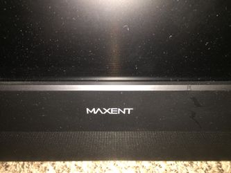 Maxent 32” flat screen TV with built in DVD player.