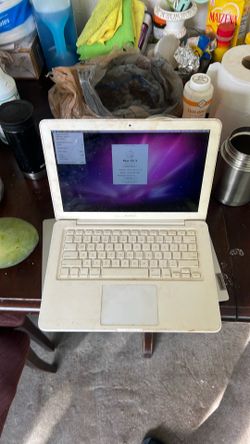 vintage Apple MacBook, possibly model A1342 from around 2009 or 2010.