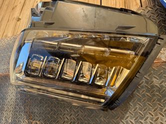 Cadillac Escalade oem headlight