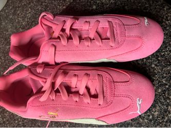 Pink and white pumas