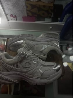 Brand new coach shoes in the size 7.5