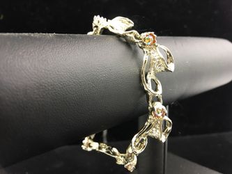 Vintage gold tone ribbon bracelet with rhinestone