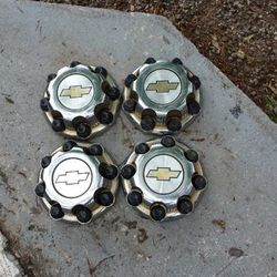 4 chevy hubcaps 8 lugs,,are Chrome