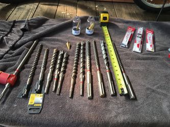 Hilti bits, 12 in all verses sizes, three packs of Sawzall blades , and three MSD-HEX bits , never used new in cases.