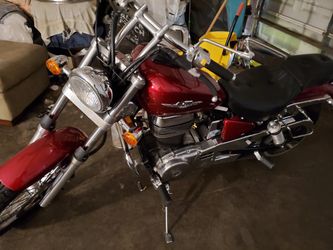 Suzuki boulevard 650 S40 12,583 miles never been dropped and bike has been garaged, asking 2300