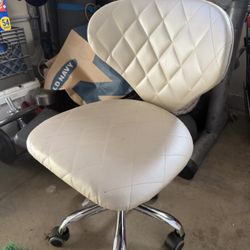 metalic cream swivel chair