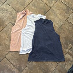 Bella Women’s High Neck Tanks. Size M