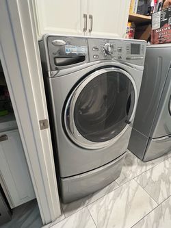 Premium Whirlpool Front-Load Washer & Dryer Set with Matching Storage Pedestals!