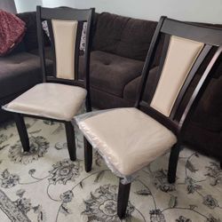 Two matching dining chairs