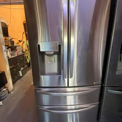 LG REFRIGERATOR 4 DOORS STAINLESS STEEL. FREE DELIVERY AND INSTALLATION 