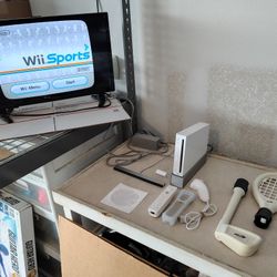 Nintendo Wii Bundle with Wii Sports, Remote, Nunchuck, etc.