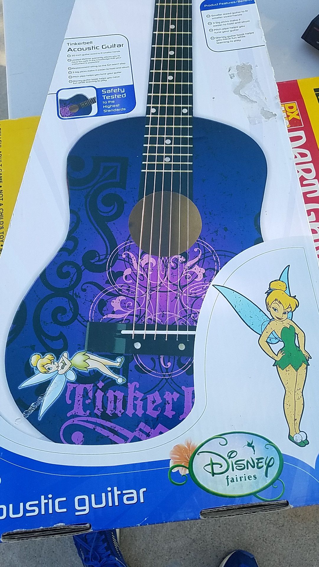Disney Tinkerbell Wasburn acoustic guitar in box.