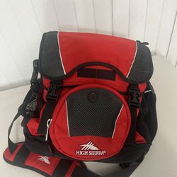High Sierra Red Multi Function Backpack Shoulder Bag Great Condition. This backpack is small but versatile and is in excellent cosmetic condition and 