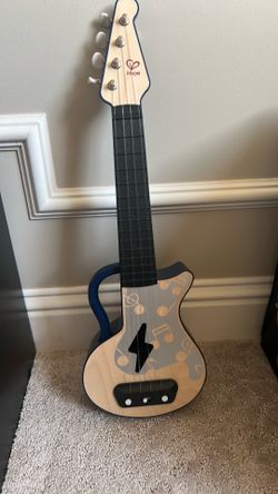 Toddler guitar with built in music