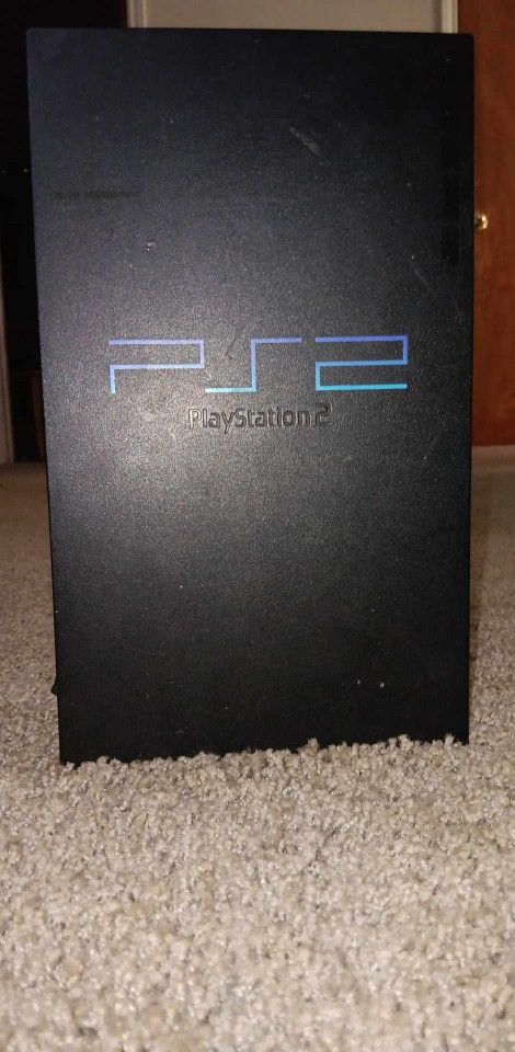 Playstation 2 Along With Ps2 Games And A Few Ps3 Games