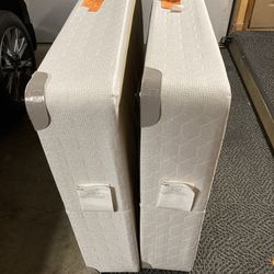 Set of twin box springs for twin beds or a king bed.