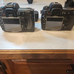 2 Nikon D300 Camera Bodies, Speedwinder And 50mm Prime Lens Combo