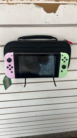 Nintendo Switch with Pastel Joy-Cons and Case