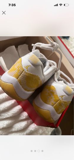 Air Jordan 11 Low White Yellow Sneakers