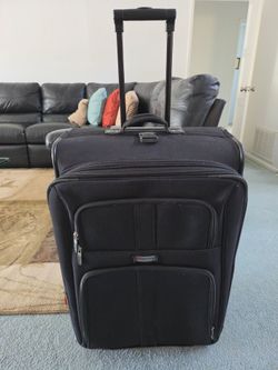 Extra Large Black Delsey Brand Suitcase