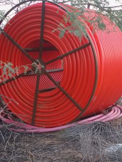 Full Reel 2" Smooth wall orange HDPE conduit -unused surplus