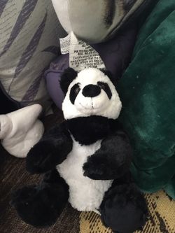 Stuffed black and white bear