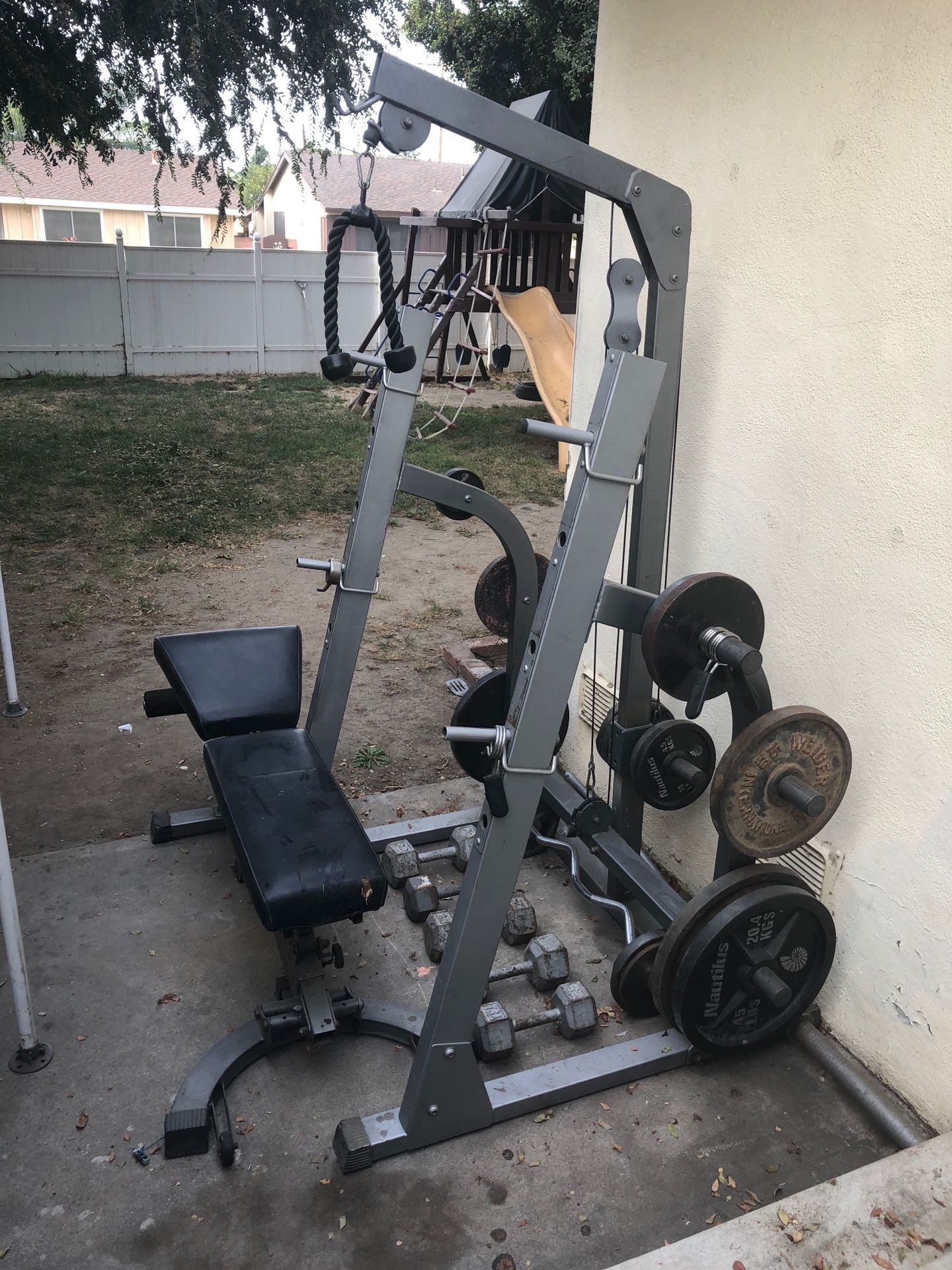 Squat rack with bench press . Weights included